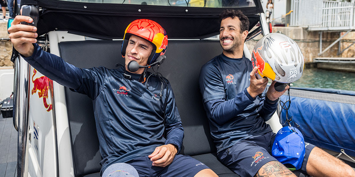 Daniel Ricciardo & Marc Márquez race  Alinghi Red Bull AC40s ahead of Spanish F1